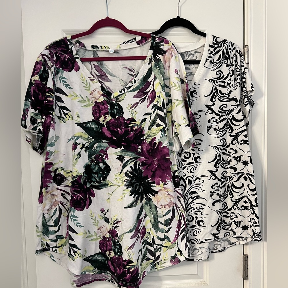Pair of LuLaRoe v neck t shirts with longer hems. Floral and scroll